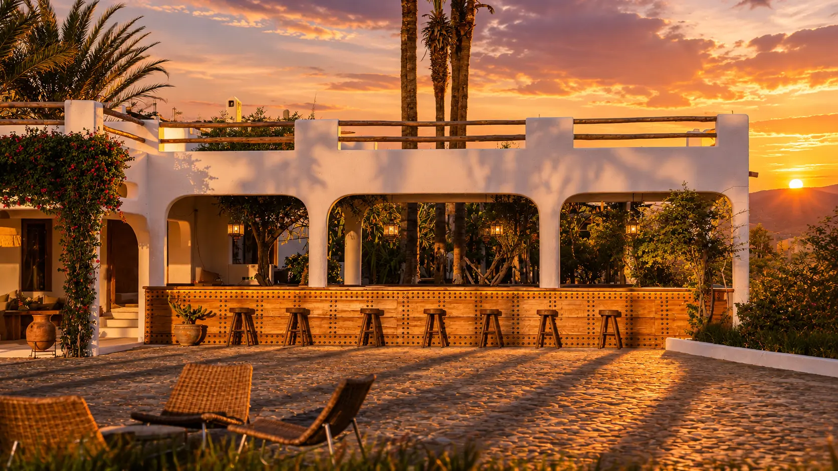 Sunset Dining at Pure House On The Lake sunset dining table set in the Agafay Desert dunes